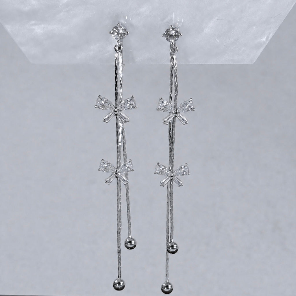 Celeste Bow Tassel Clip-On Earrings