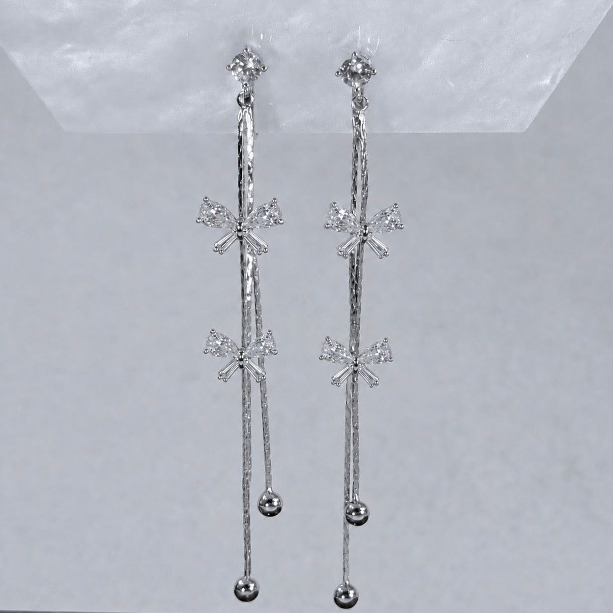 Celeste Bow Tassel Clip-On Earrings