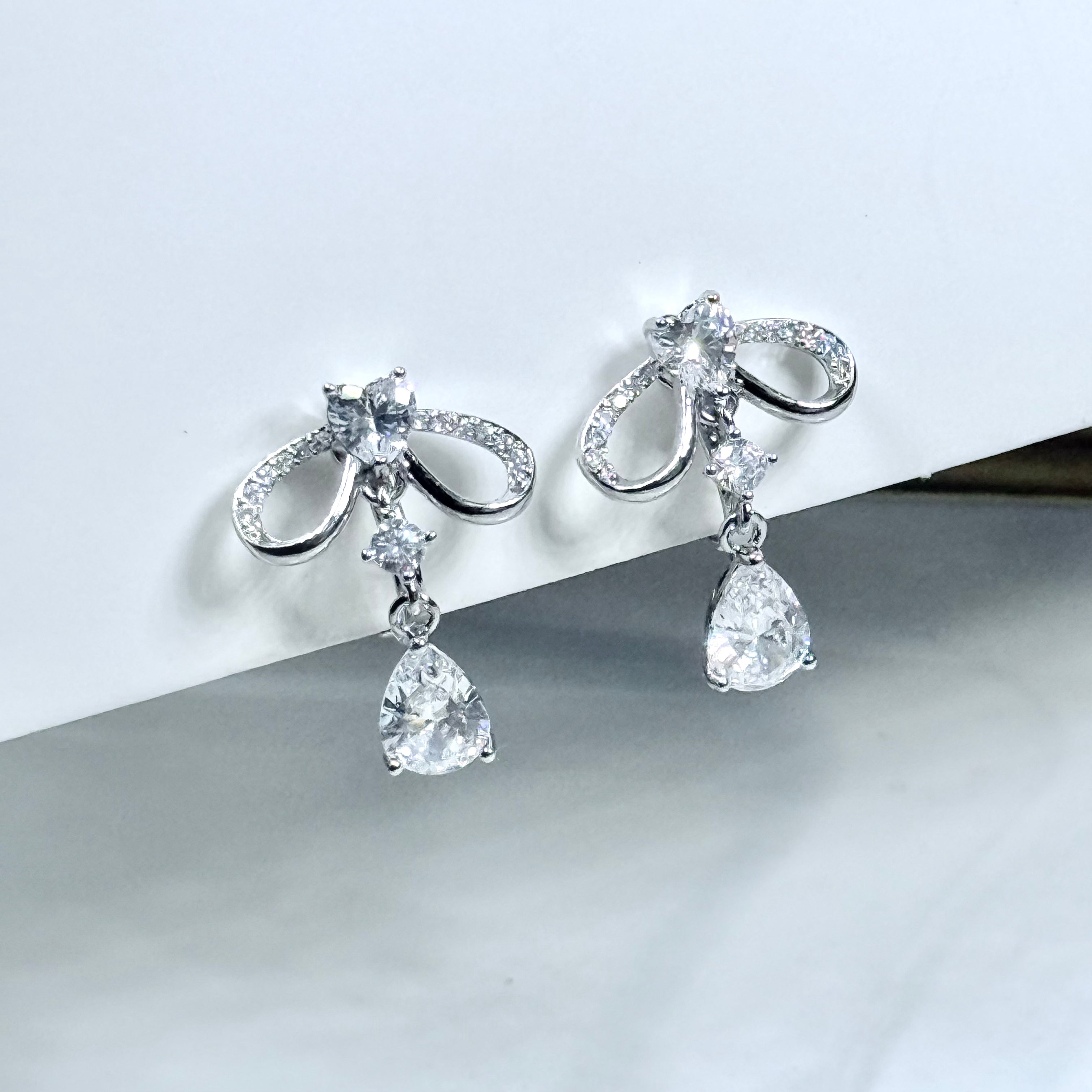 Crystal Bow Teardrop Clip-On Earrings
