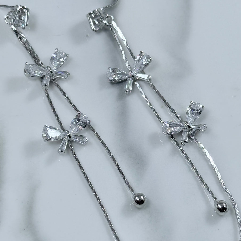Celeste Bow Tassel Clip-On Earrings