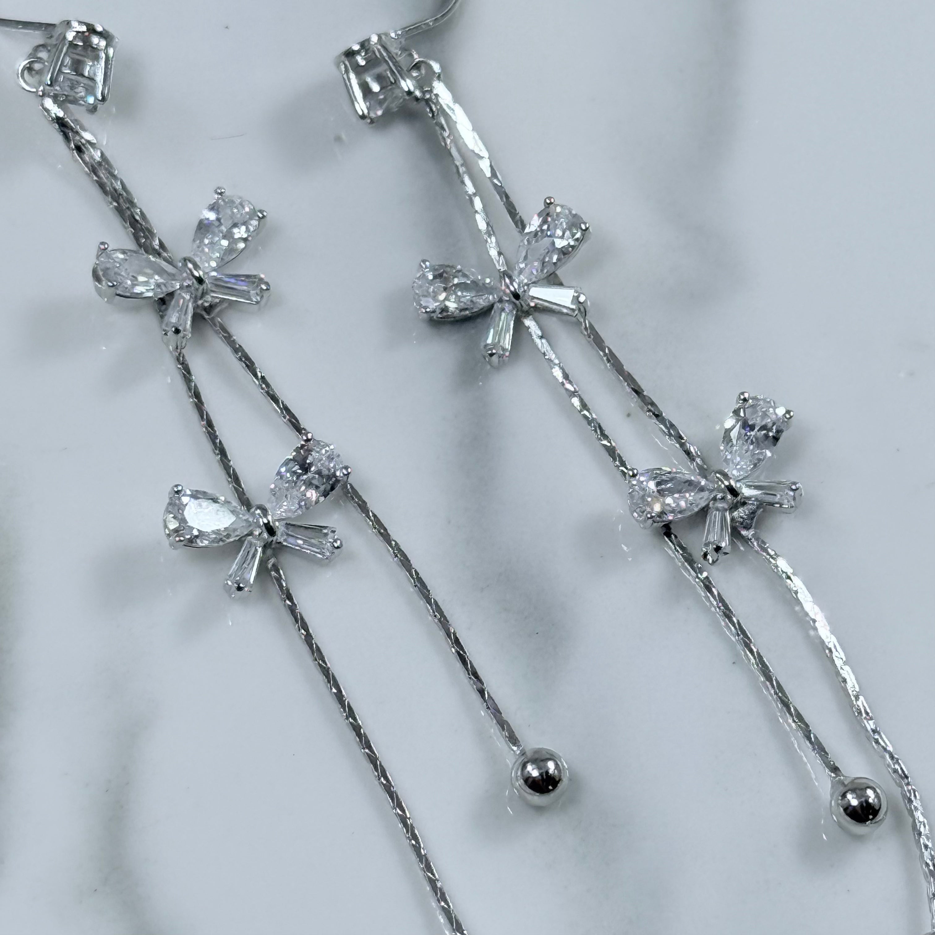 Celeste Bow Tassel Clip-On Earrings